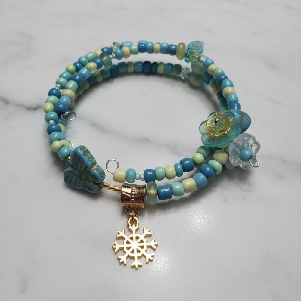 Wire Blue and Gold Beaded Bracelet with Ships Wheel Charm